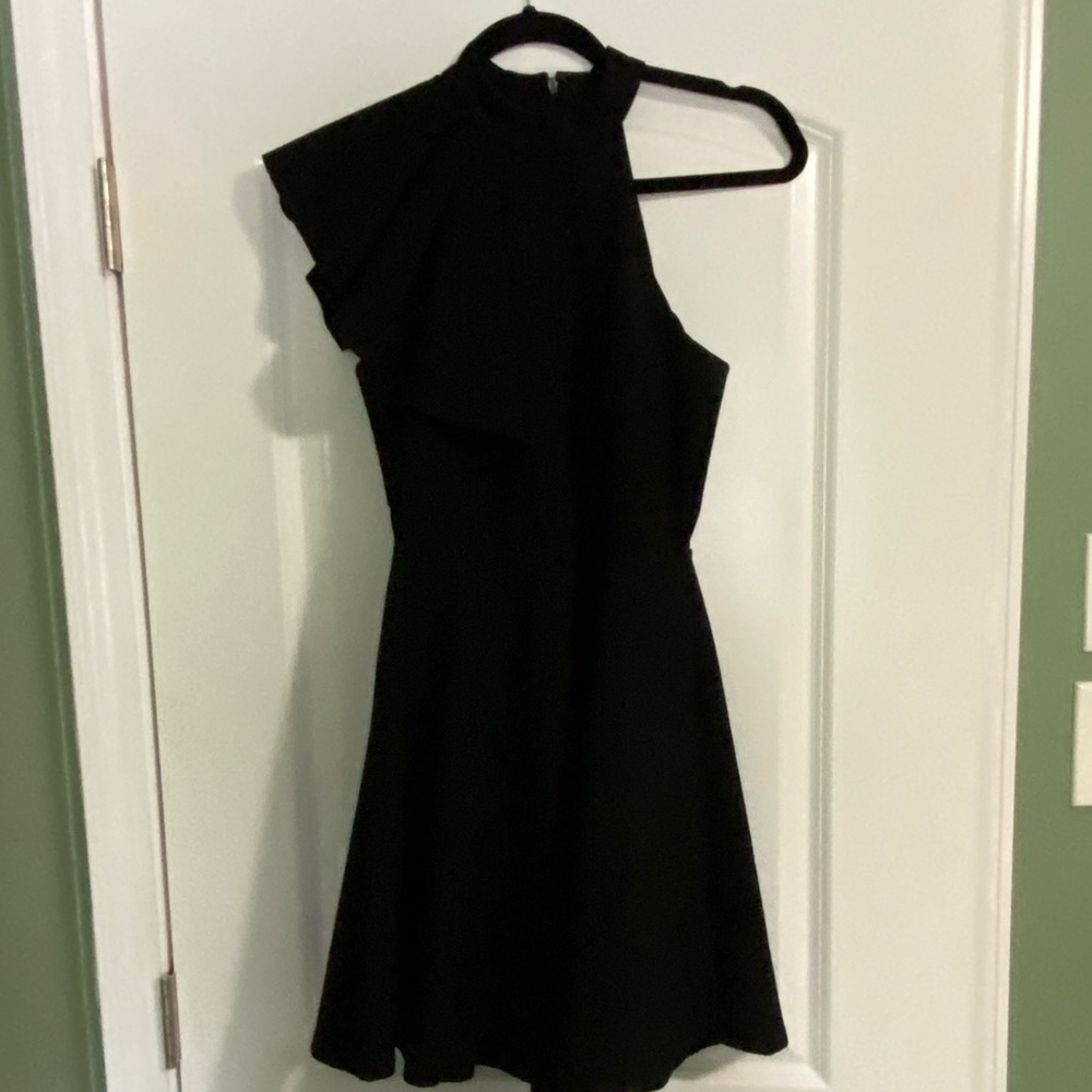 Black ruffle shoulder dress